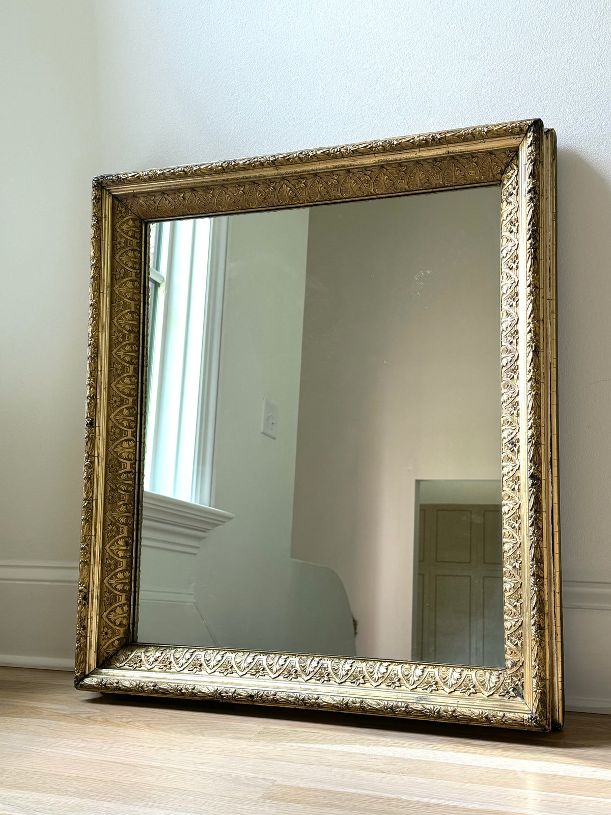 Antique French Gilt Mirror with Neoclassical Anthemion Frame