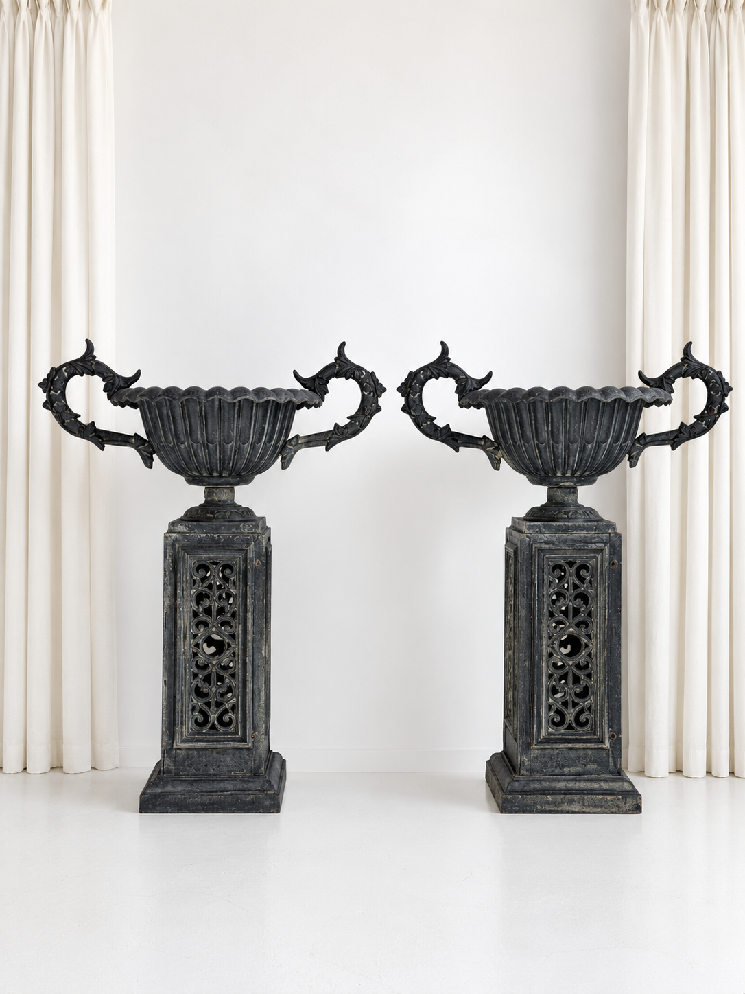 Pair of Garden Urns on a Pierced Pedestals
